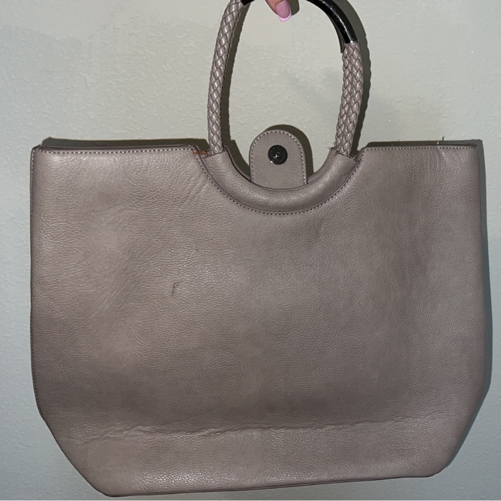 A Miztique leather arm bag